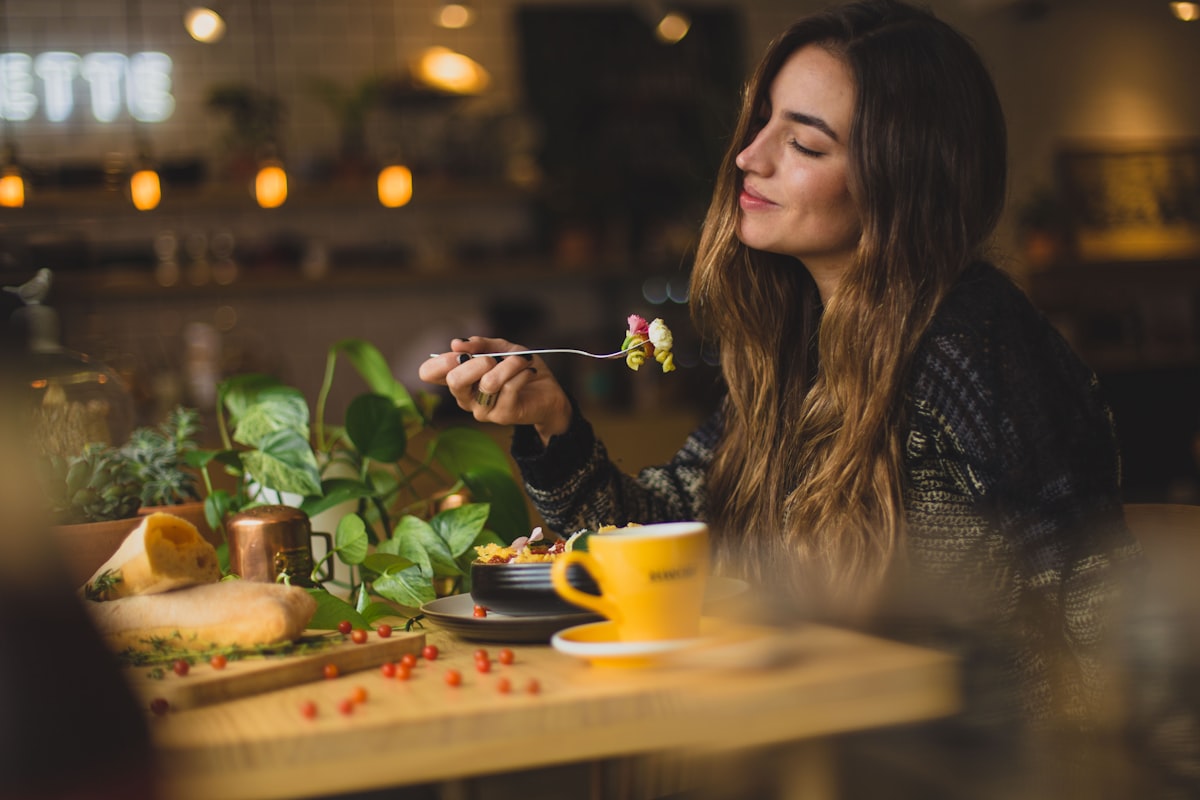 Peaceful woman enjoying mindful eating